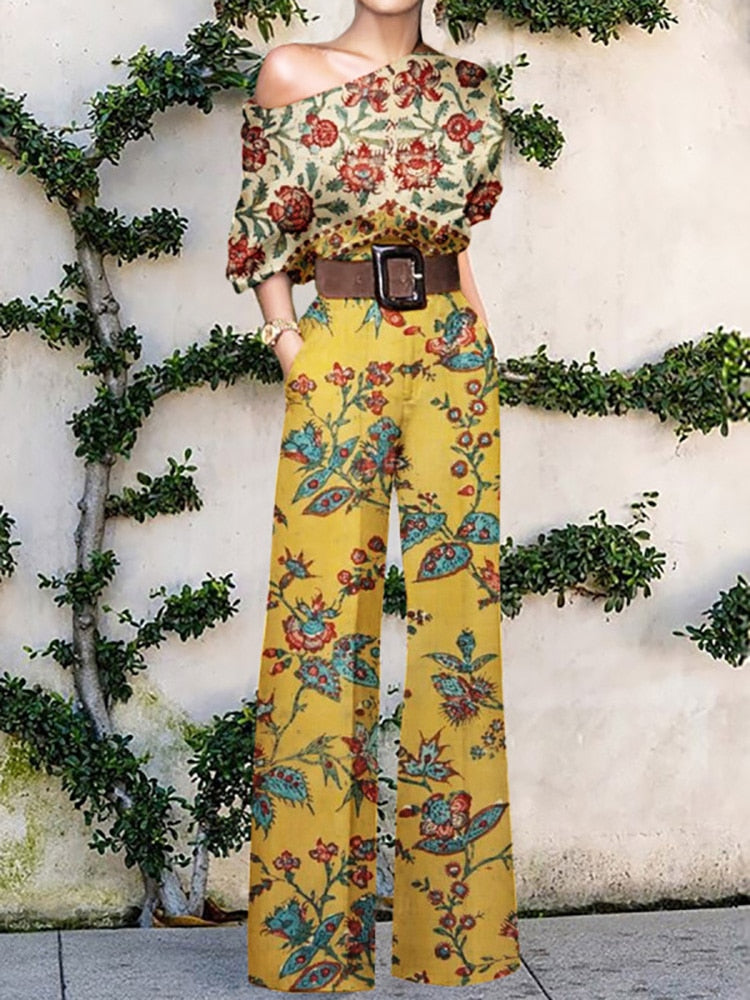Valenzora | Strapless jumpsuit with floral pattern