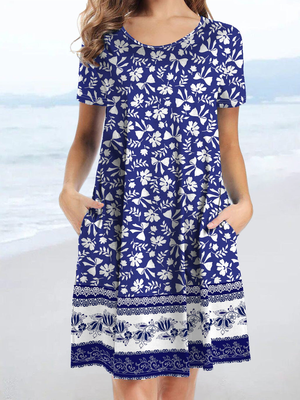 Women's casual dress with playful floral print and practical pockets Drune