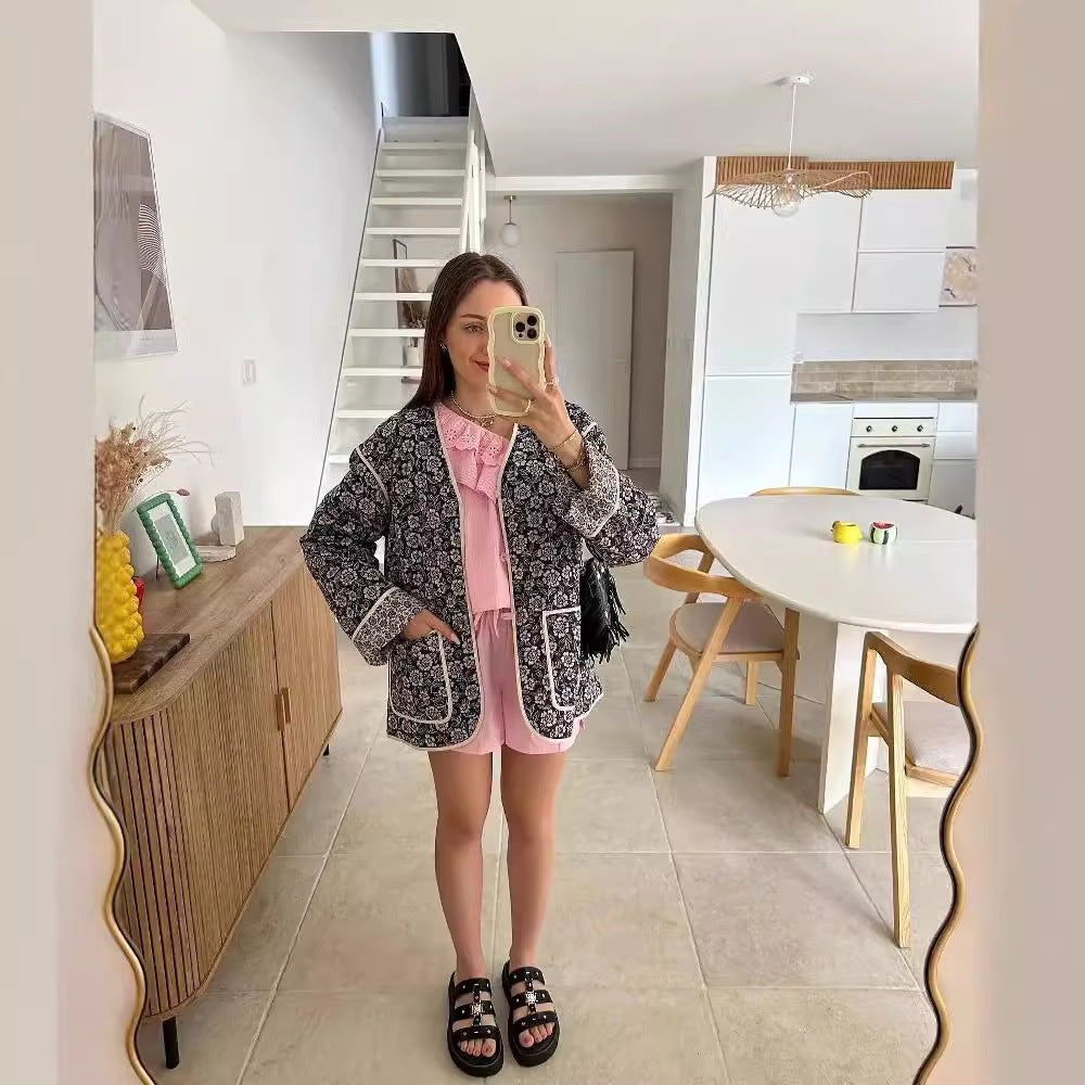 Women's elegant floral jacket in an oversized cut with structured details, size S