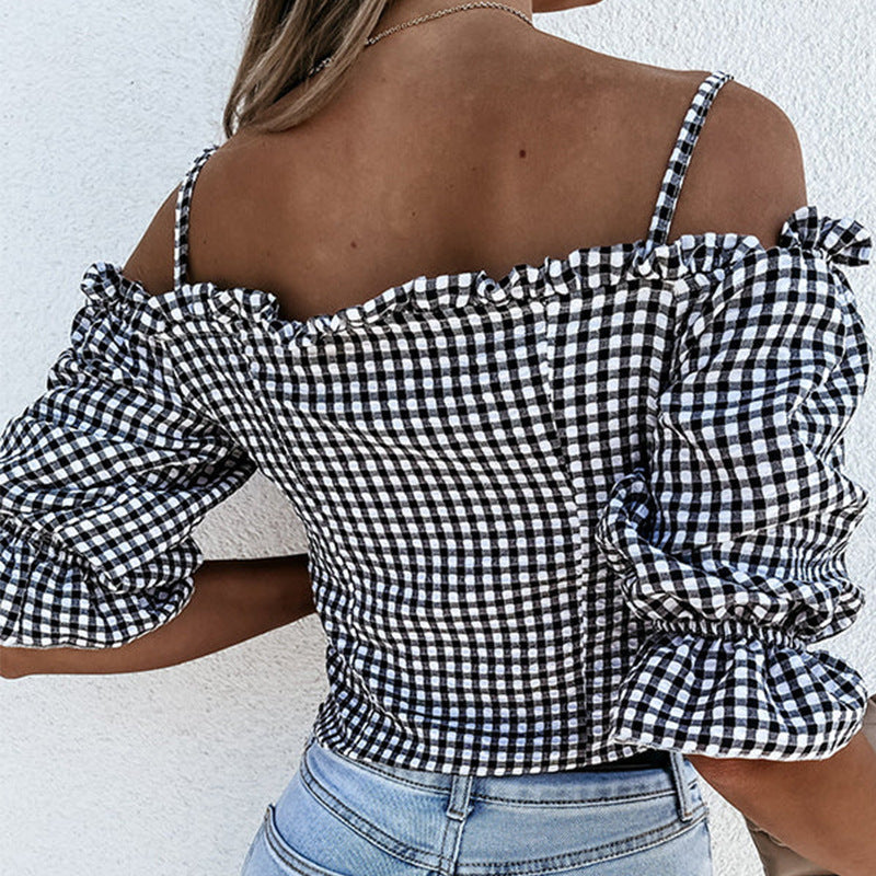 Women's off-the-shoulder blouse with ruffle details and check pattern, size [size missing]