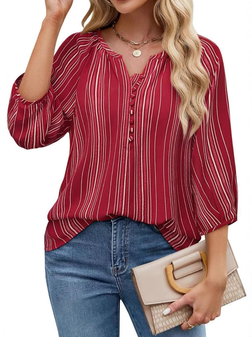 Women's elegant tunic blouse with sophisticated stripes, size