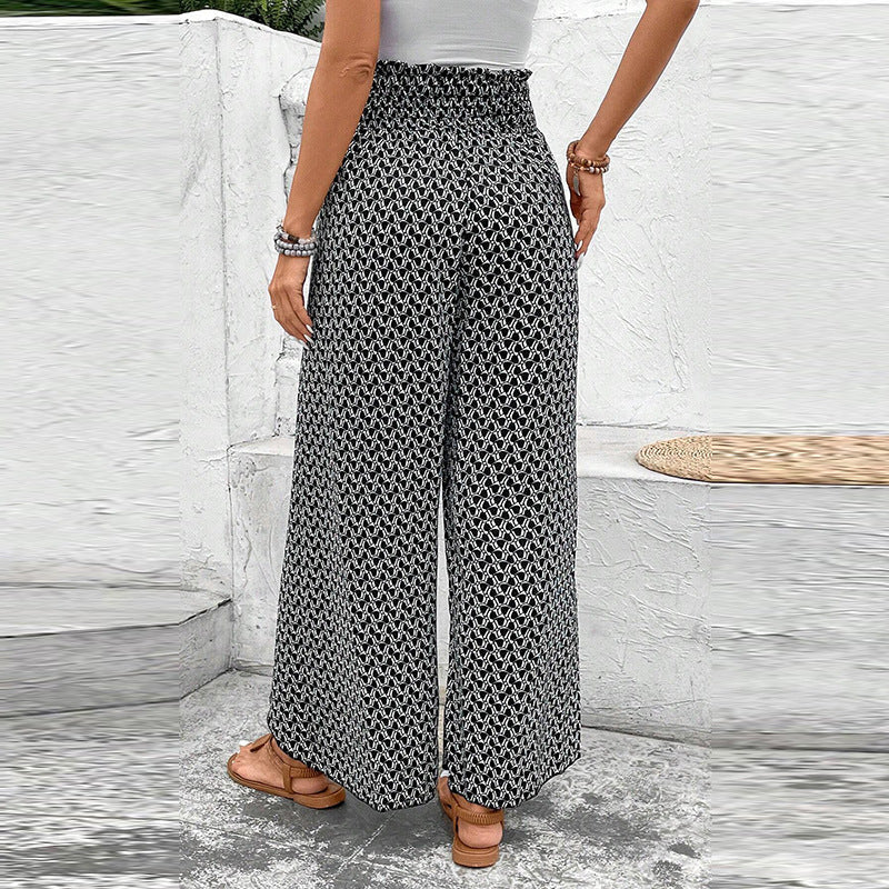 Women's wide-leg summer trousers with floral pattern and elasticated waistband, size