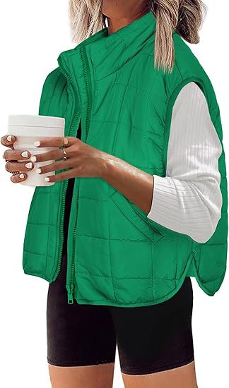 Women's quilted vest with high collar and practical side pockets, size