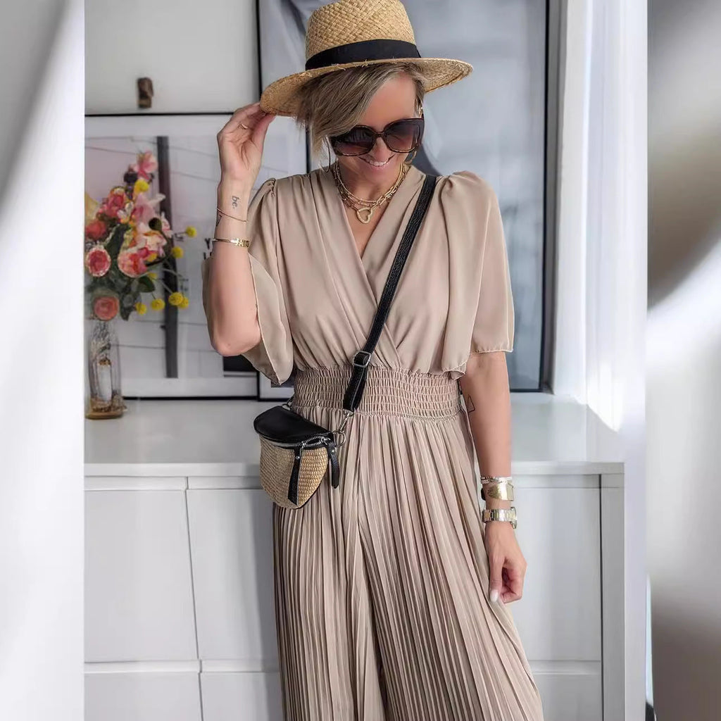 Women's elegant jumpsuit with deep V-neck and voluminous sleeves, size [size missing]