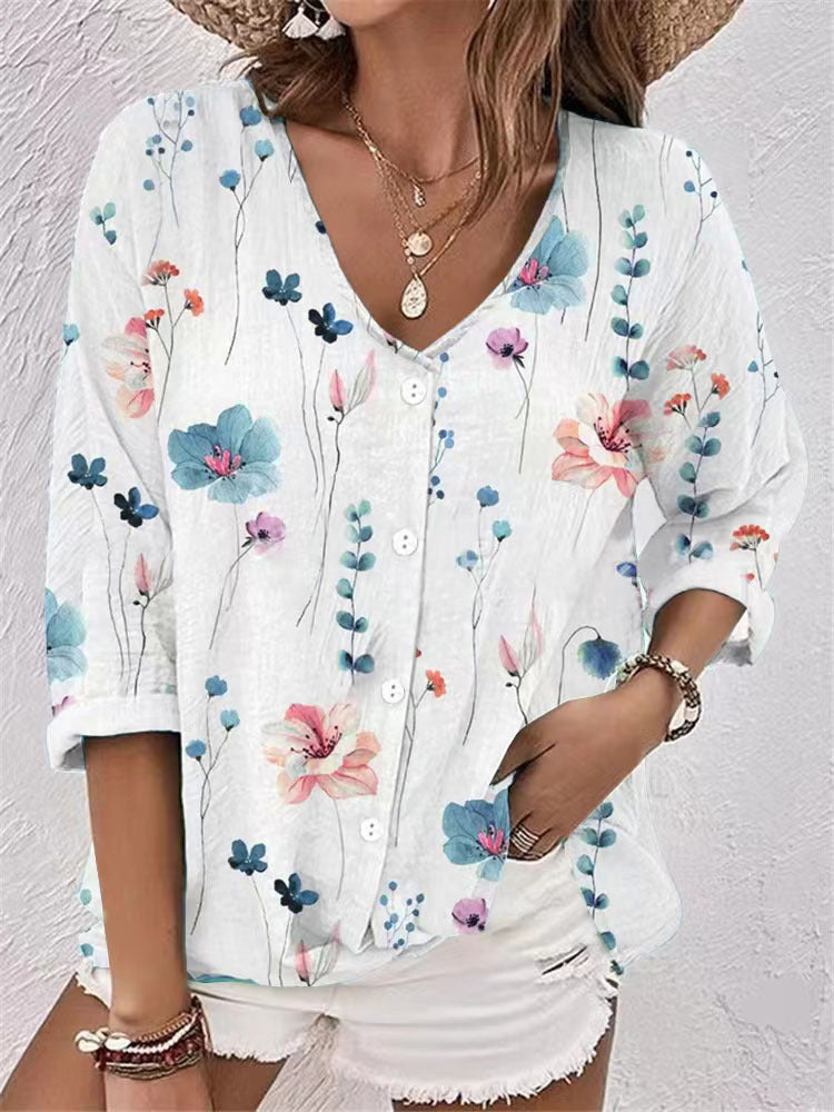 Women's blouse with floral print and modern button design, size