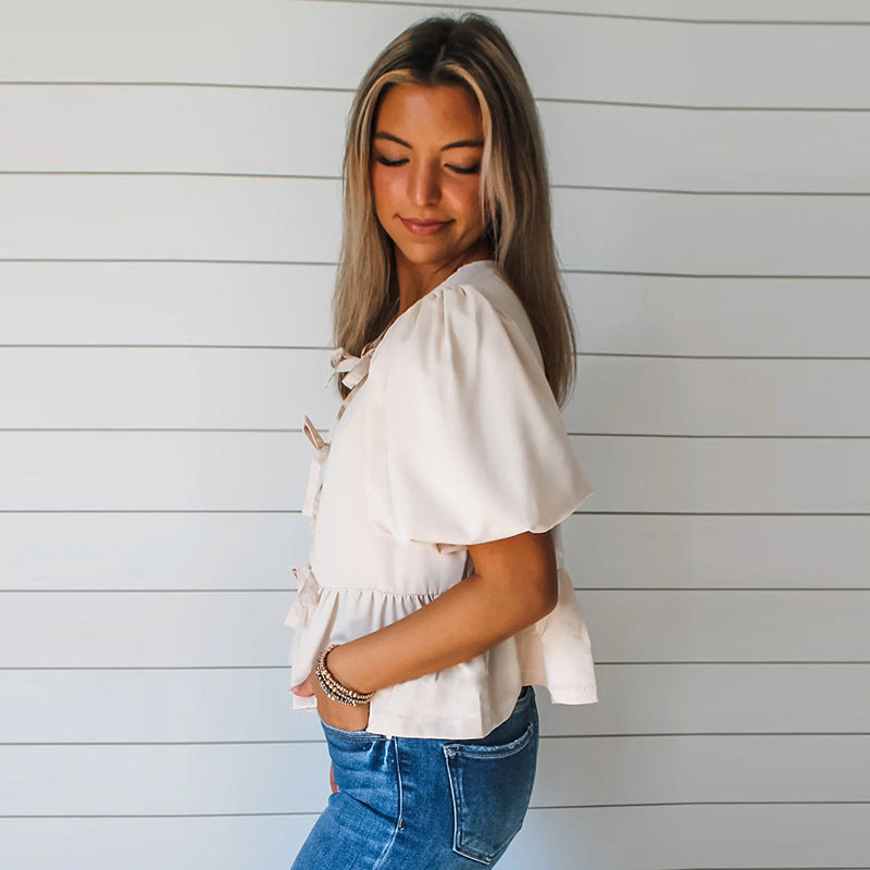 Women's blouse with ruffles and ties, size