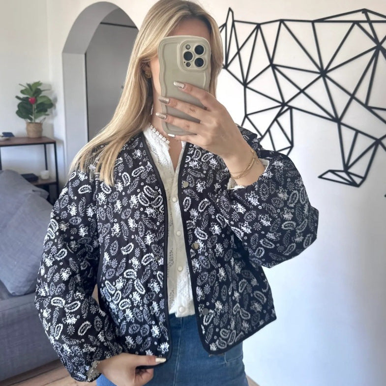 Women's quilted jacket with floral design and practical pockets, size S