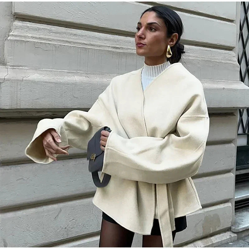 Women's elegant wrap jacket with waist belt, size