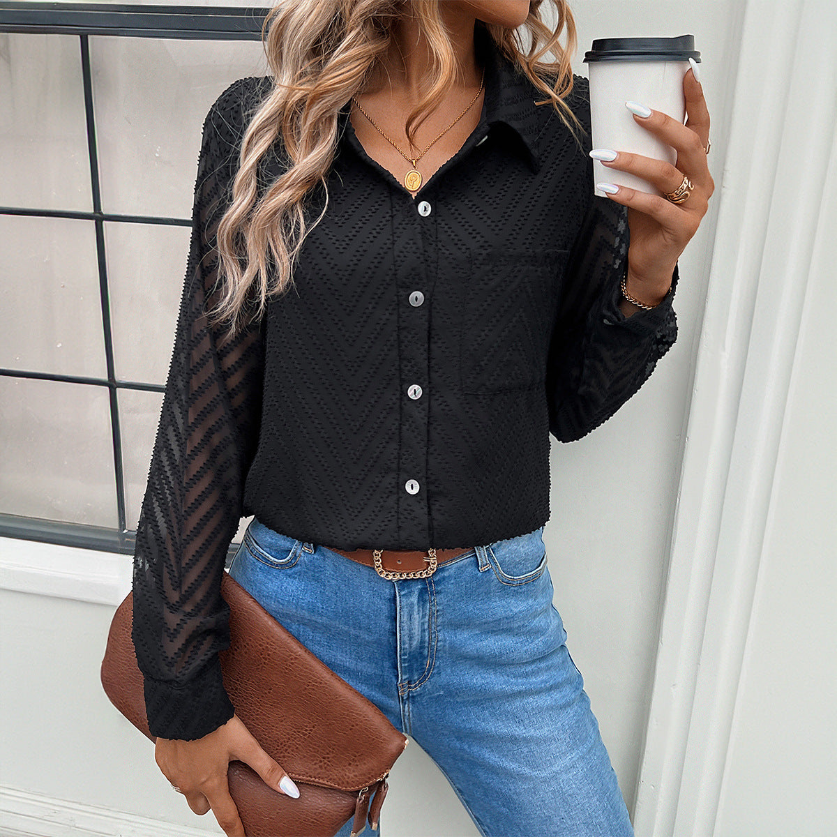 Women's elegant blouse with sheer sleeves and button closures, size [size missing]