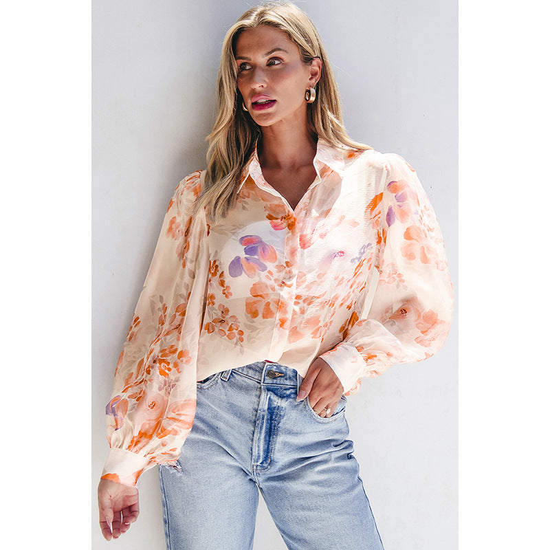Women's airy blouse shirt with floral design and voluminous sleeves, size S
