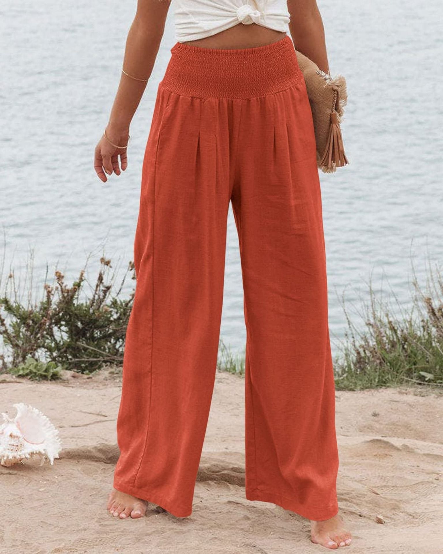 Women's wide-legged linen trousers with elasticated waistband and pleats, size