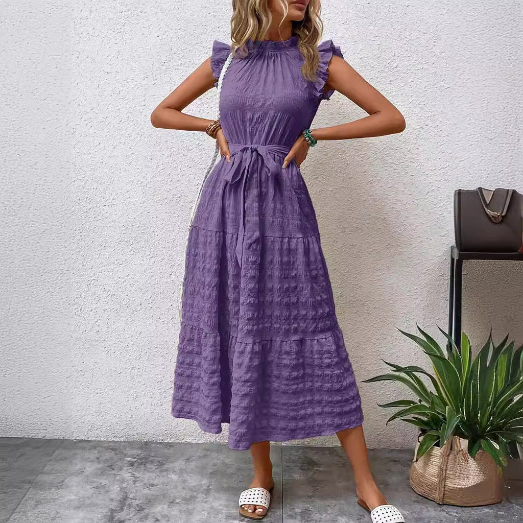 Women's wrap dress with ruffle details and a tailored hem, size