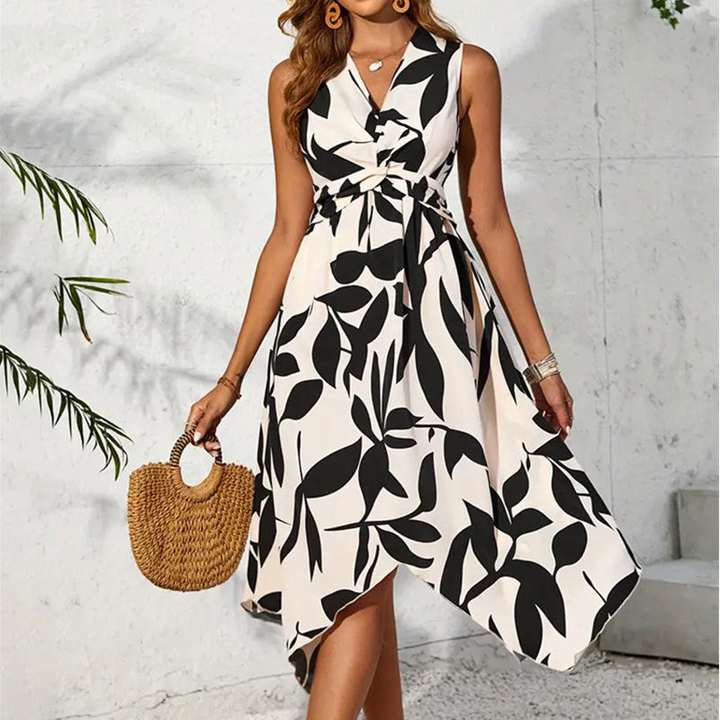Women's knee-length dress with floral pattern and wrap detail, size S