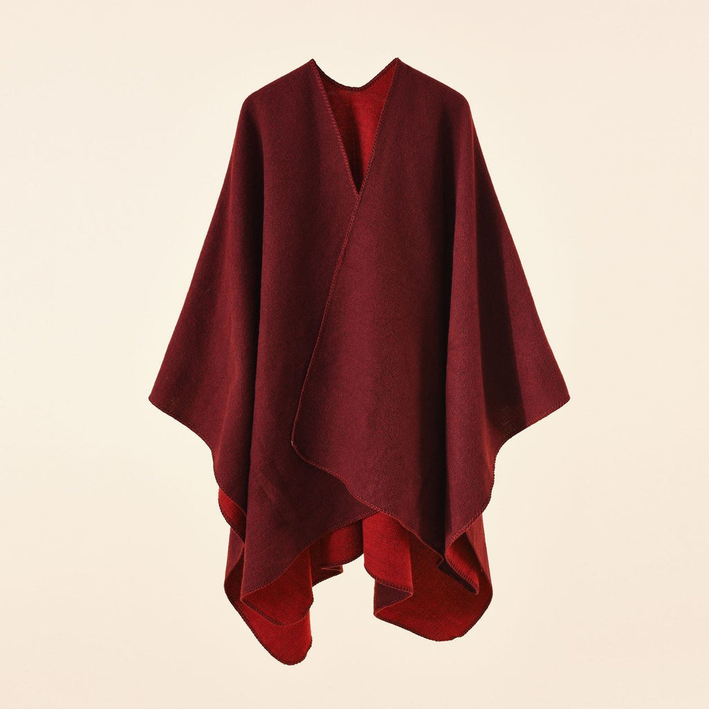 Women's knitted poncho with asymmetrical cut and high warmth retention, size