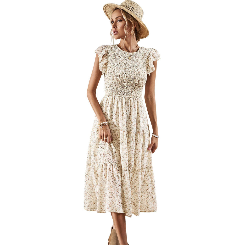 Women's midi dress with floral design and flattering ruffled hem, size [size missing]