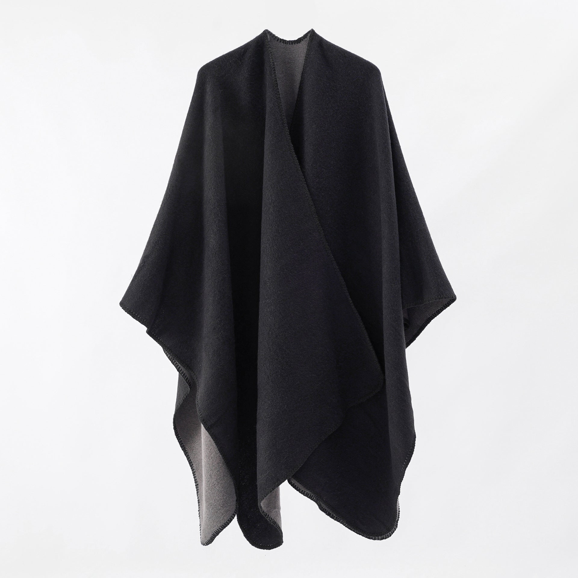 Women's knitted poncho with asymmetrical cut and high warmth retention, size