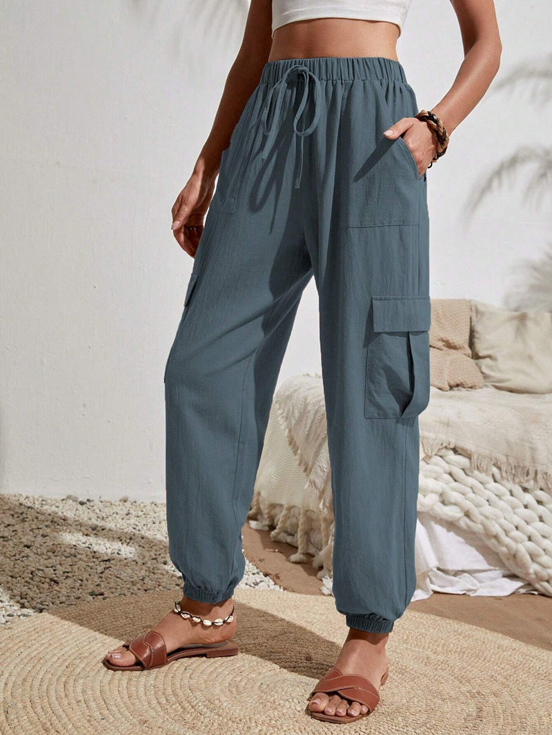 Women's cargo trousers with elasticated waistband and practical side pockets, size S