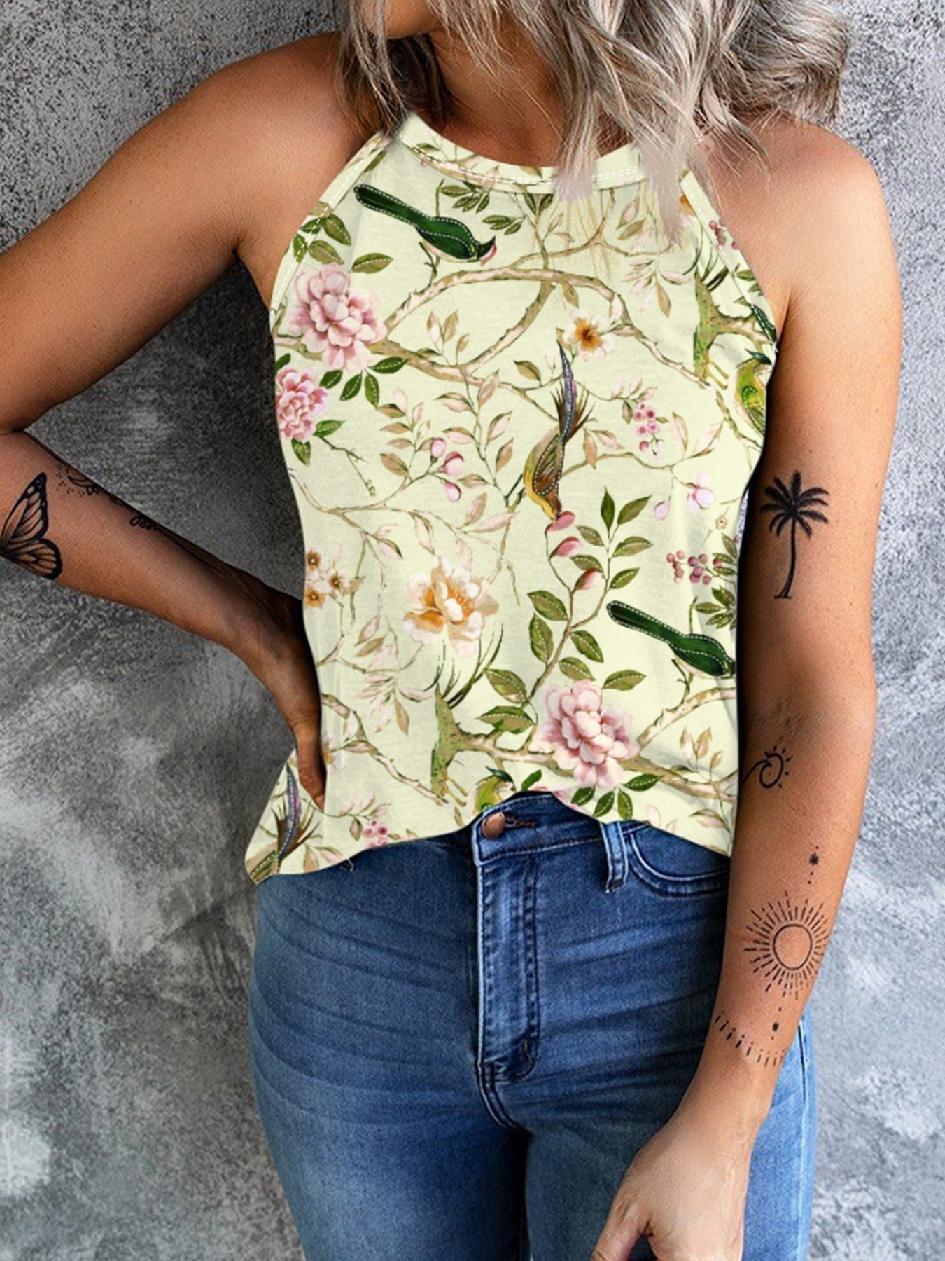 Women's sleeveless floral shirt with high collar, size