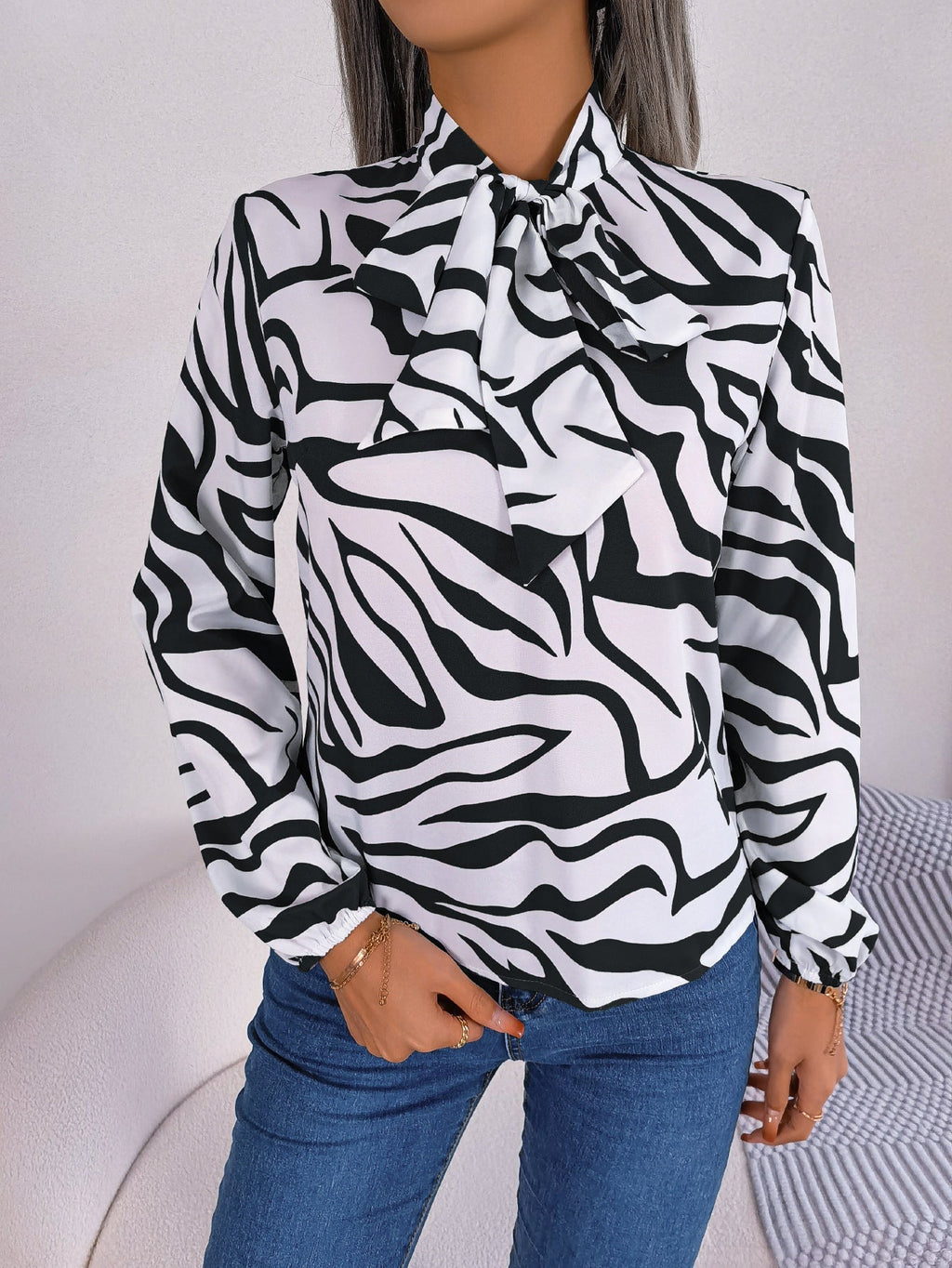 Women's blouse with fashionable zebra pattern and elegant bow collar, size