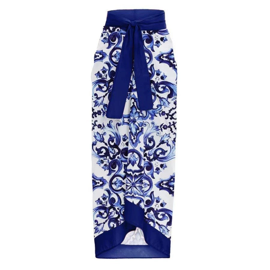 Women's swimsuit set with elegant wrap skirt look and charming motif, size S