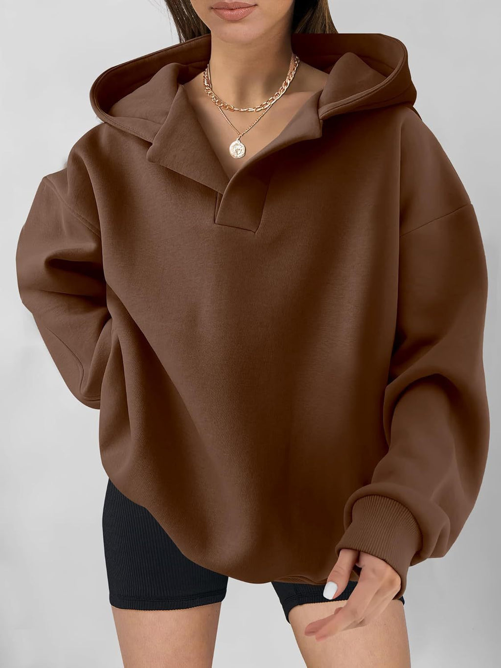 Women's oversized hoodie with a modern collar and relaxed fit, size [size missing]