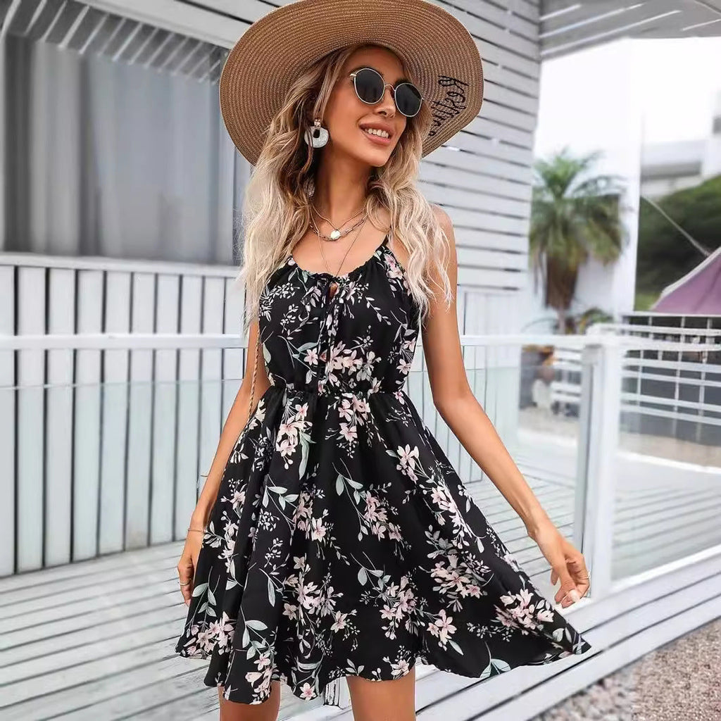 Women's floral dress with adjustable spaghetti straps and elastic waistband, size [size missing]