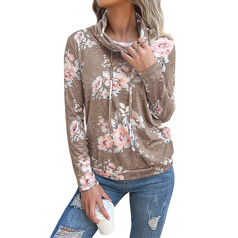 Women's blouse with floral design and modern hoodie neckline, size