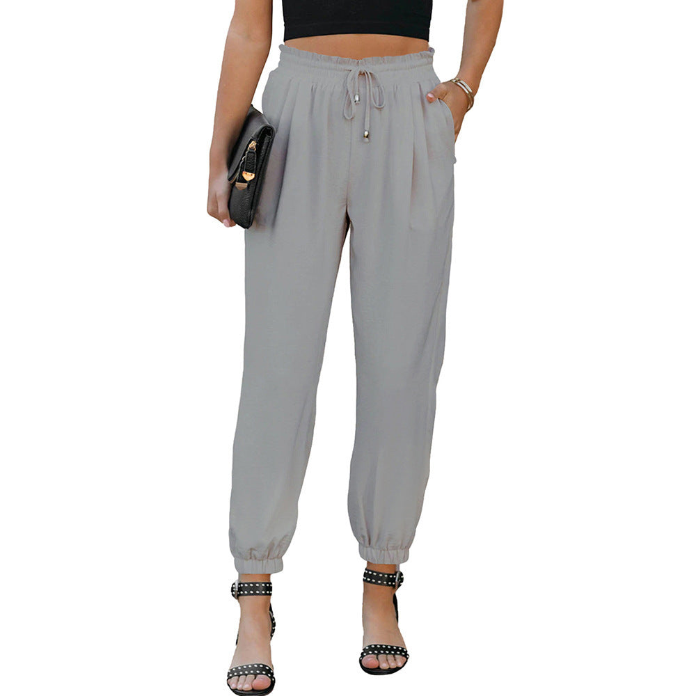 Women's casual leisure trousers with elasticated waistband and practical pockets, size S