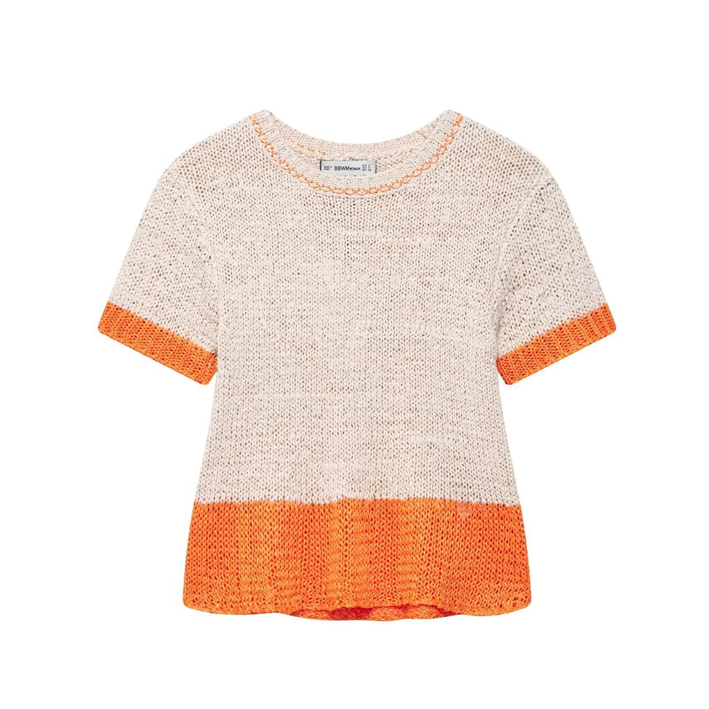 Women's knit top with contrasting color accents and a relaxed fit, size S