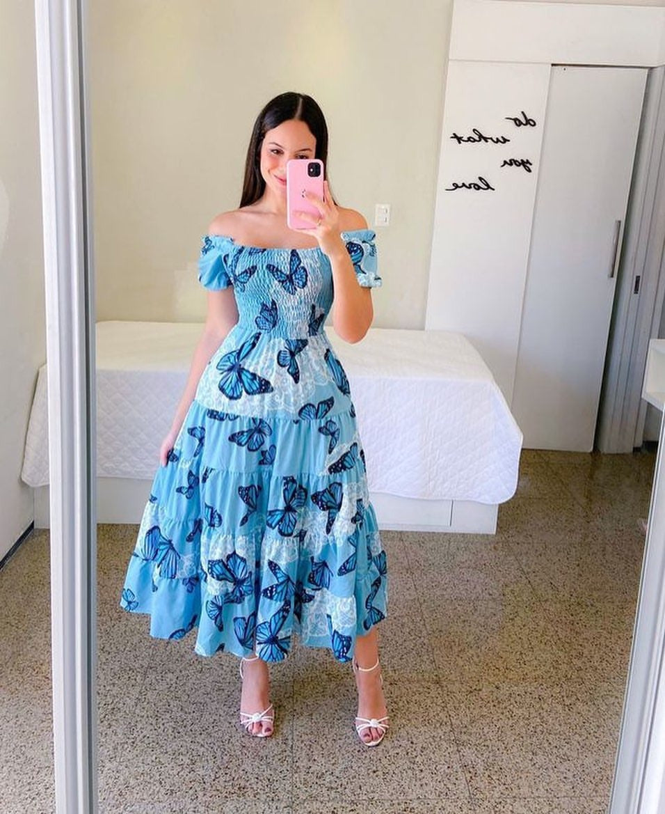 Women's midi dress with off-the-shoulder design and playful butterfly pattern, size S