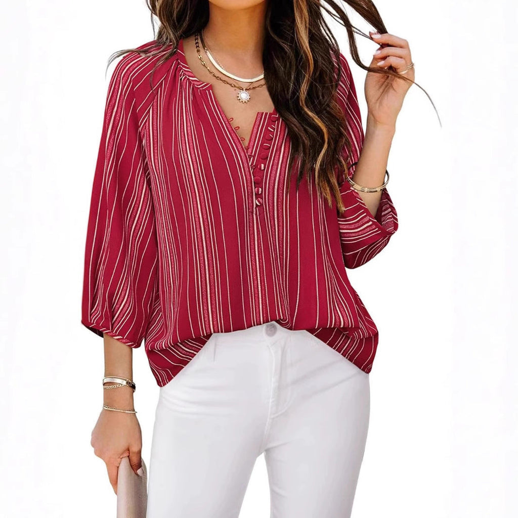 Women's elegant tunic blouse with sophisticated stripes, size