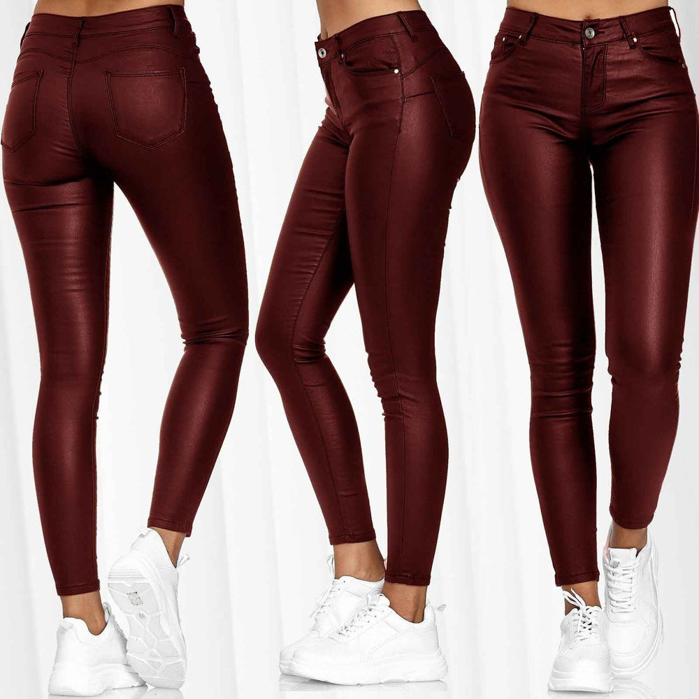 Women's figure-hugging faux leather trousers with a matte finish and low waist, size [size missing]