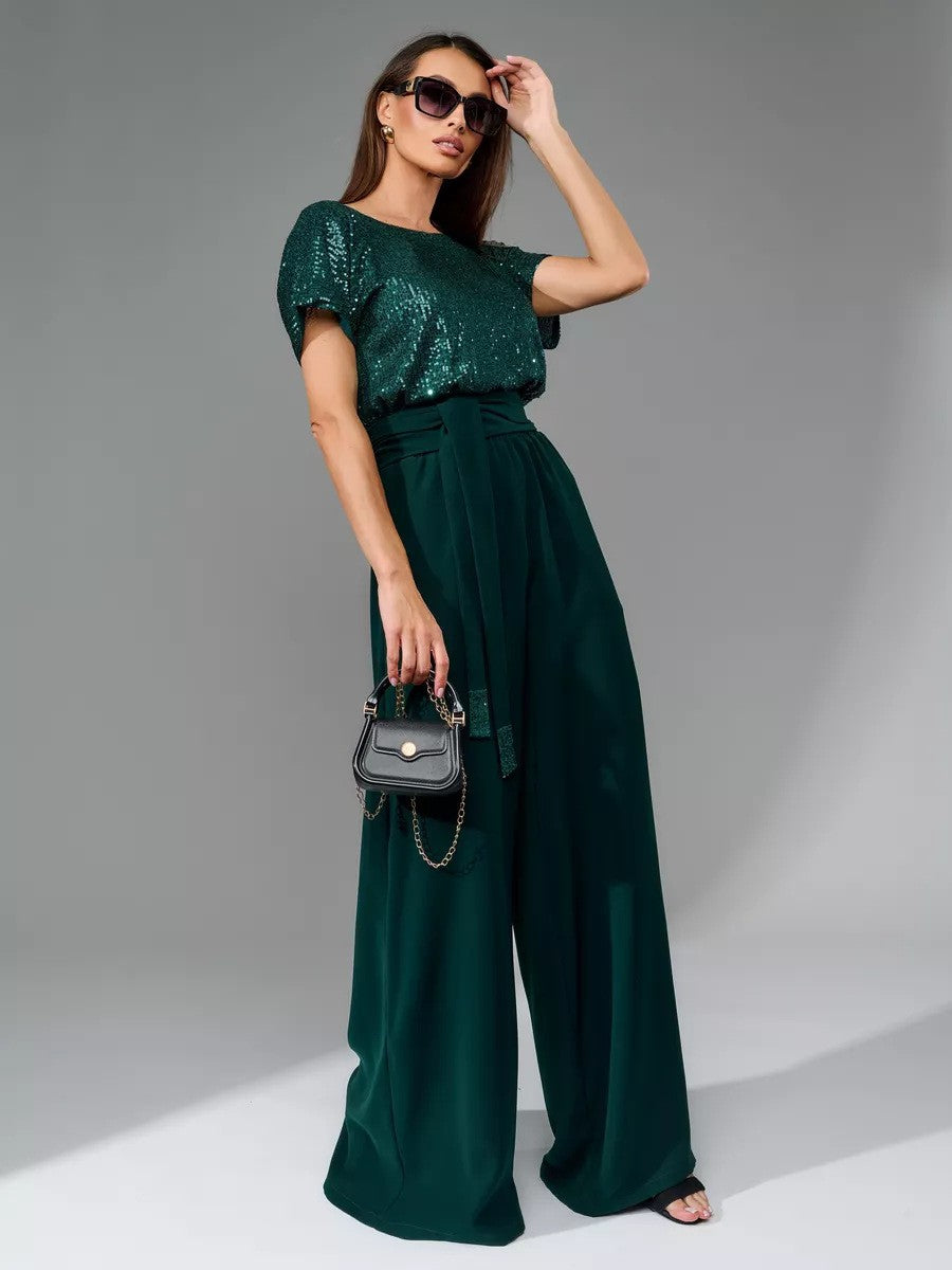 Women's glamorous jumpsuit with glittery top and wide-legged trousers, size