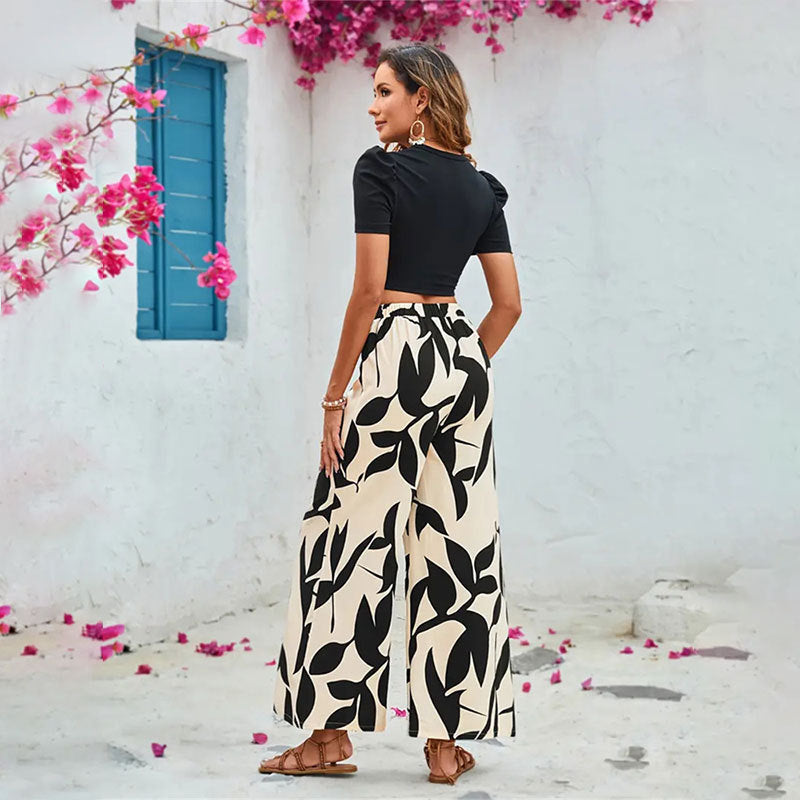 Elegante Damen-Hose mit weitem Bein und Blumenmuster in Größe