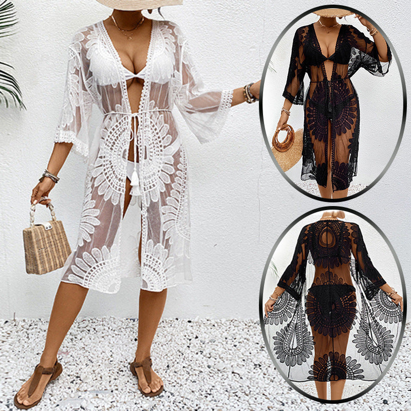 Women's chic crochet beach wrap with voluminous sleeves and elegant design, size S