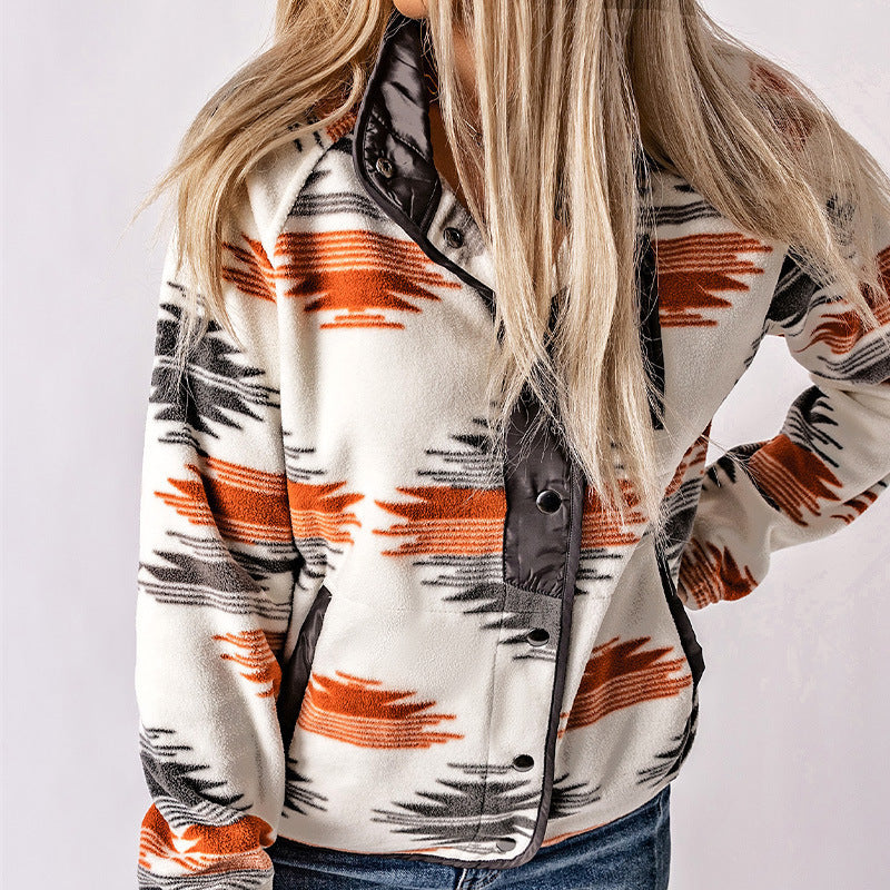 Women's cozy fleece jacket with a modern pattern and practical snap fasteners, size [size missing]