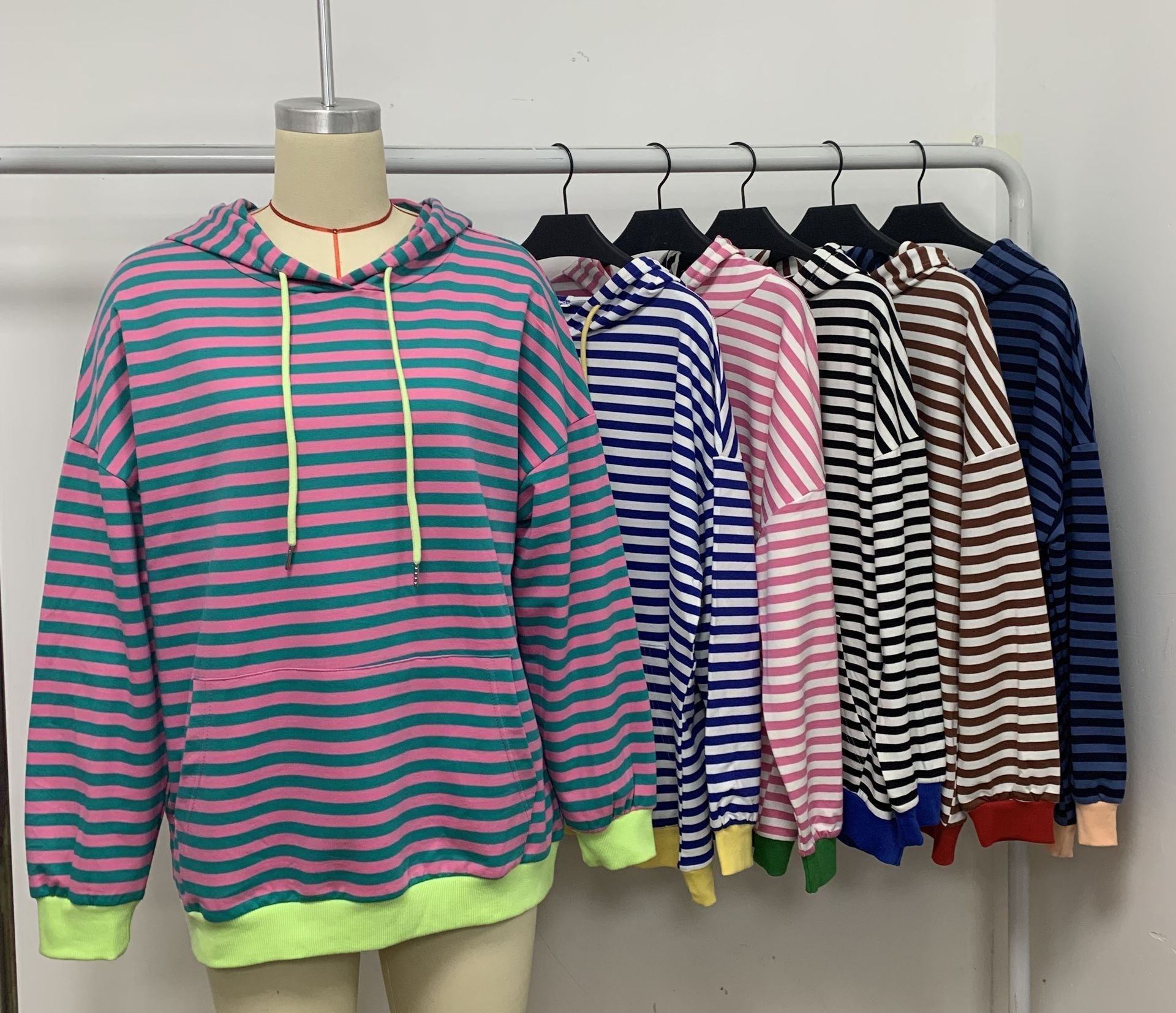 Women's striped hoodie with stylish kangaroo pocket, size S