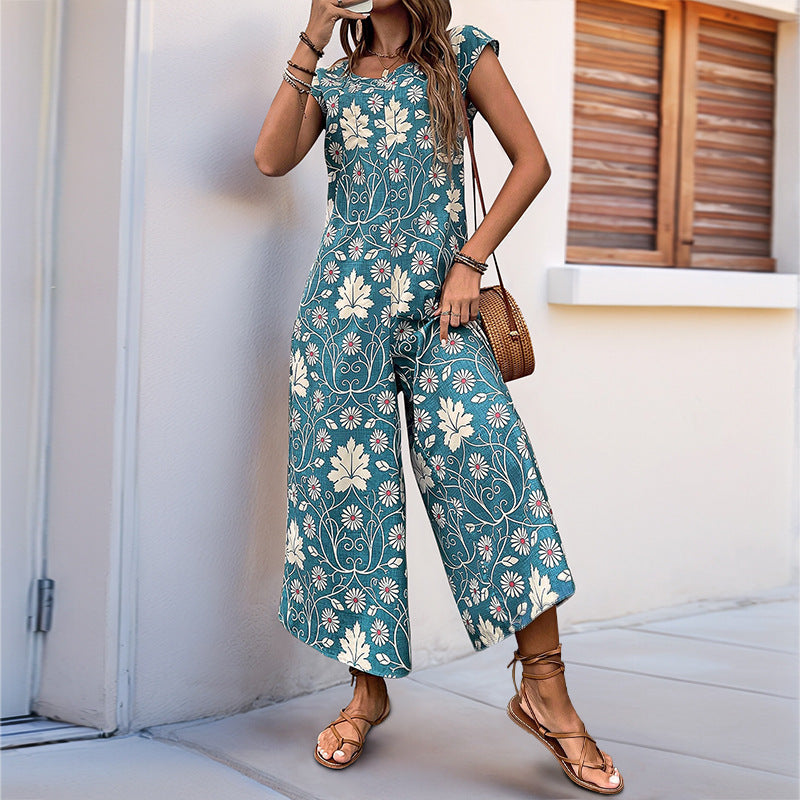 Women's jumpsuit with floral design and chestnut brown tie belt, size