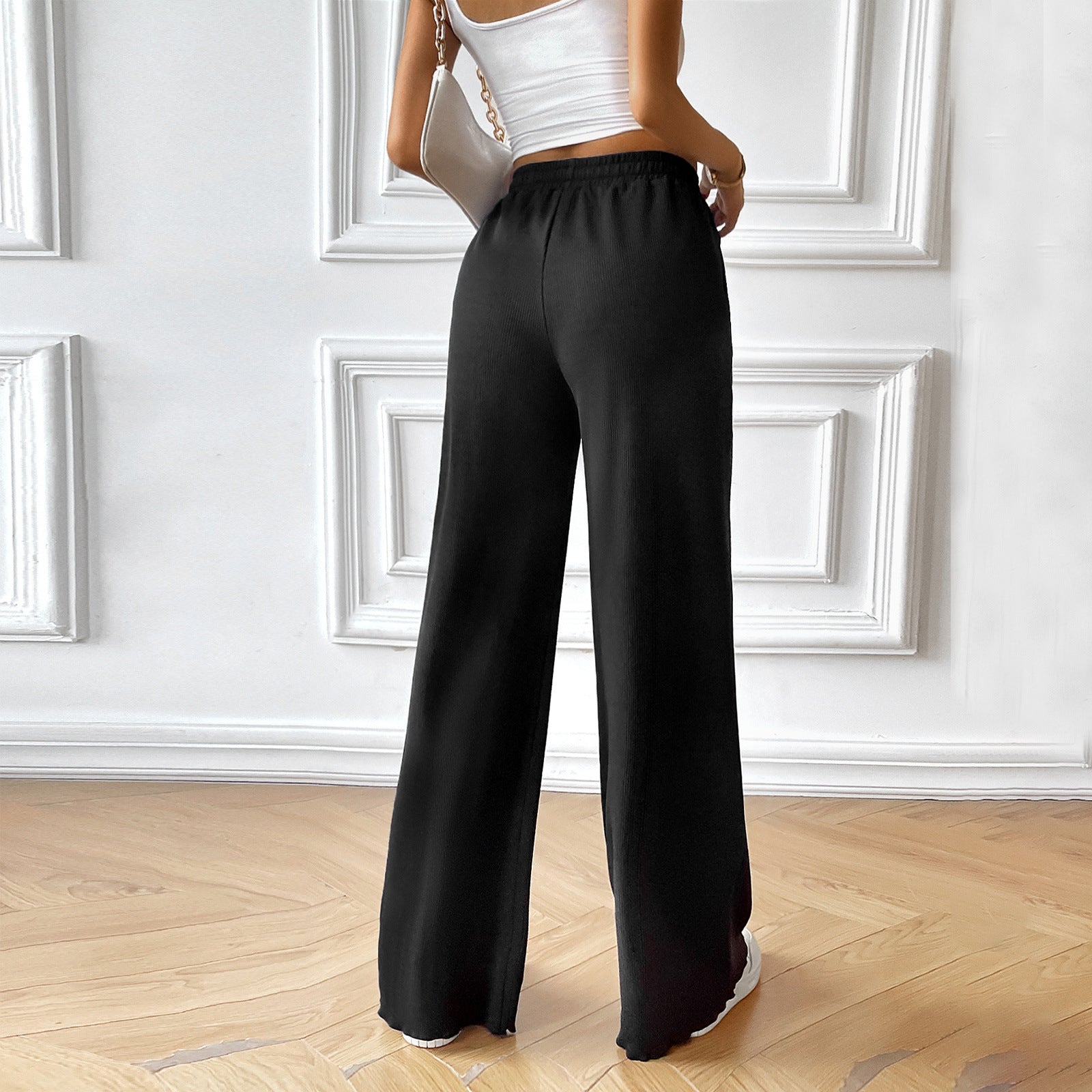Women's wide-legged summer trousers with elasticated waistband and side pockets, size