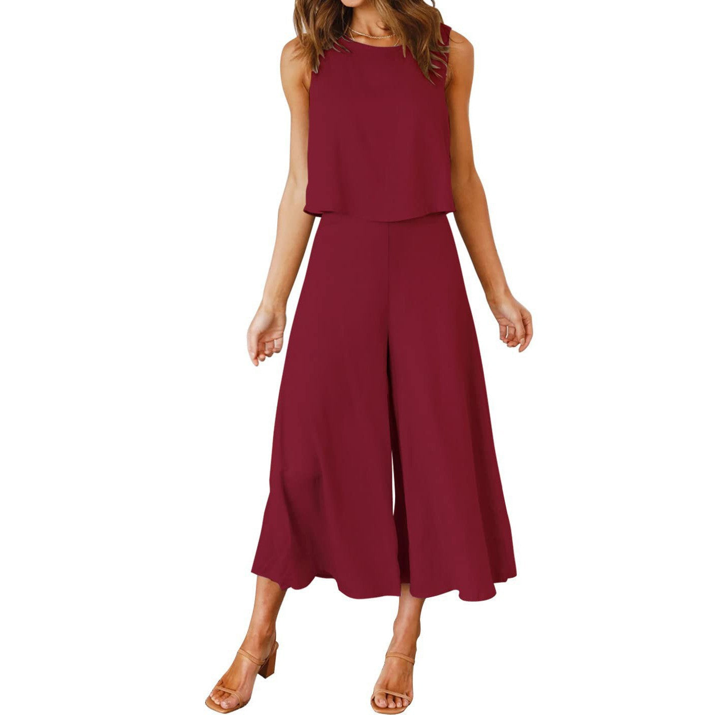 Women's airy jumpsuit with flared leg and sleeveless design, size S