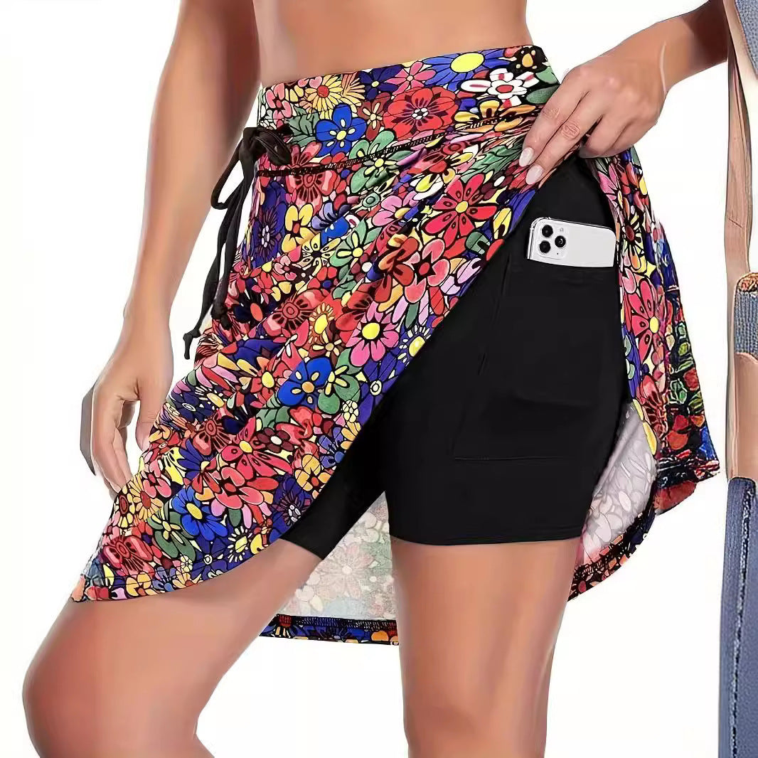 Damen Sportrock mit integrierter Shorts und praktischer Smartphonetasche, Größe