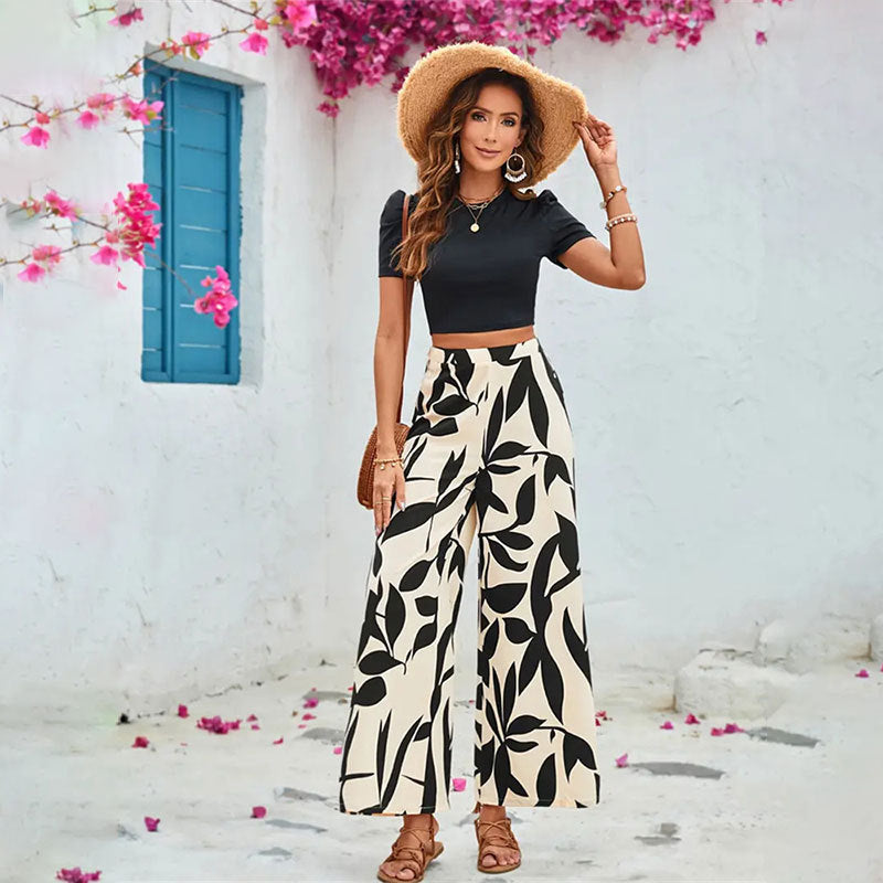 Elegante Damen-Hose mit weitem Bein und Blumenmuster in Größe