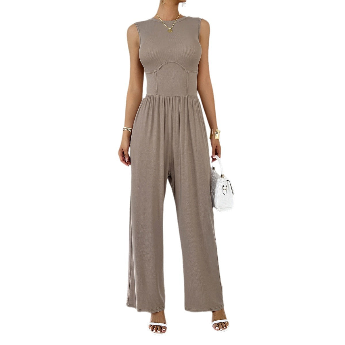 Women's elegant jumpsuit with a wide cut and figure-flattering design, size S