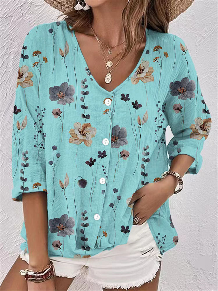 Women's blouse with floral print and modern button design, size