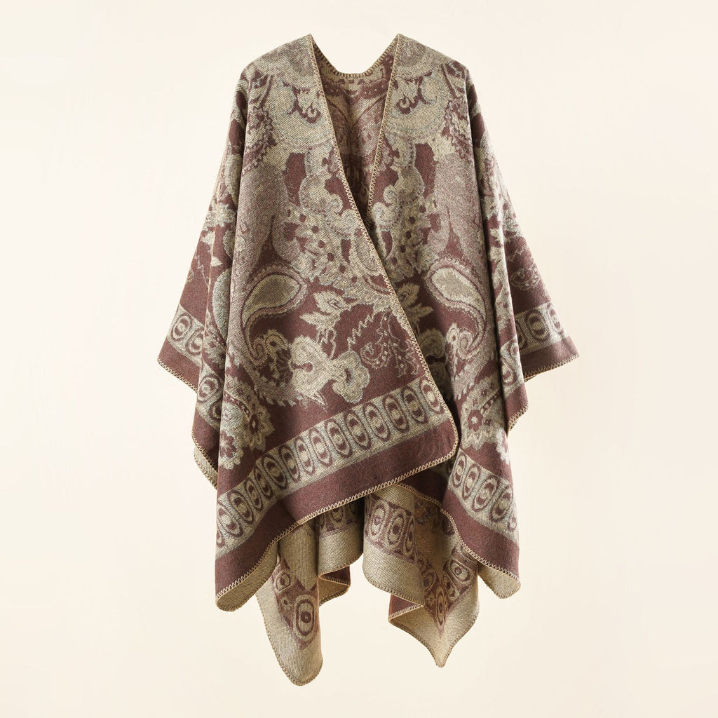 Women's elegant poncho with an artistic floral pattern and luxurious feel (size not specified)