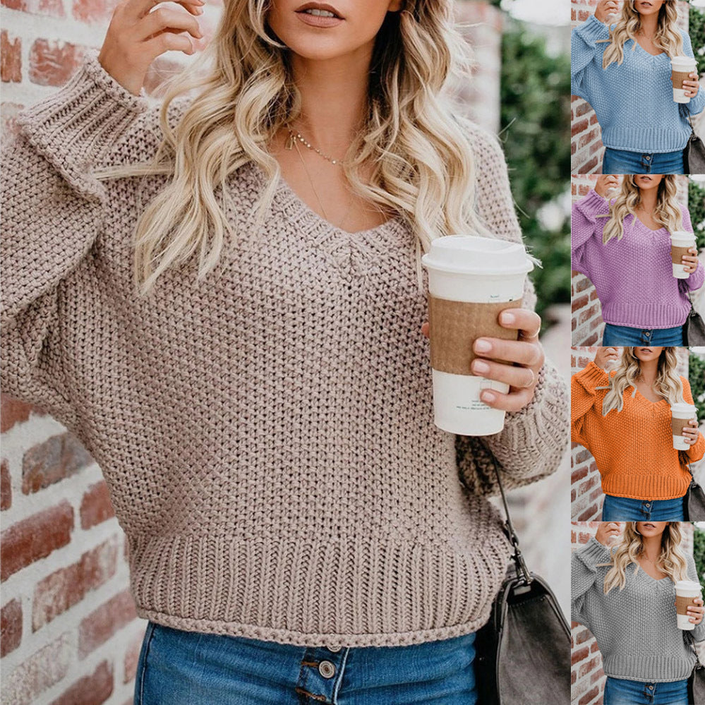 Women's chunky knit sweater with deep V-neck and relaxed fit, size
