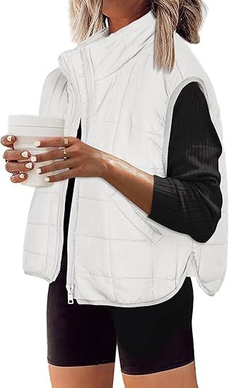 Women's quilted vest with high collar and practical side pockets, size