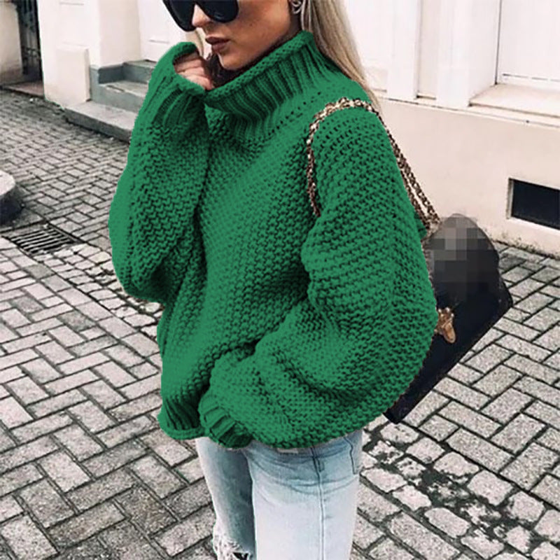 Women's chunky knit sweater with high collar and relaxed fit, size