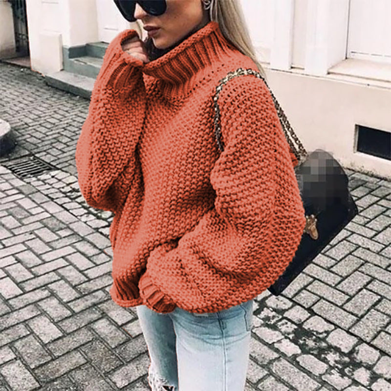 Women's chunky knit sweater with high collar and relaxed fit, size