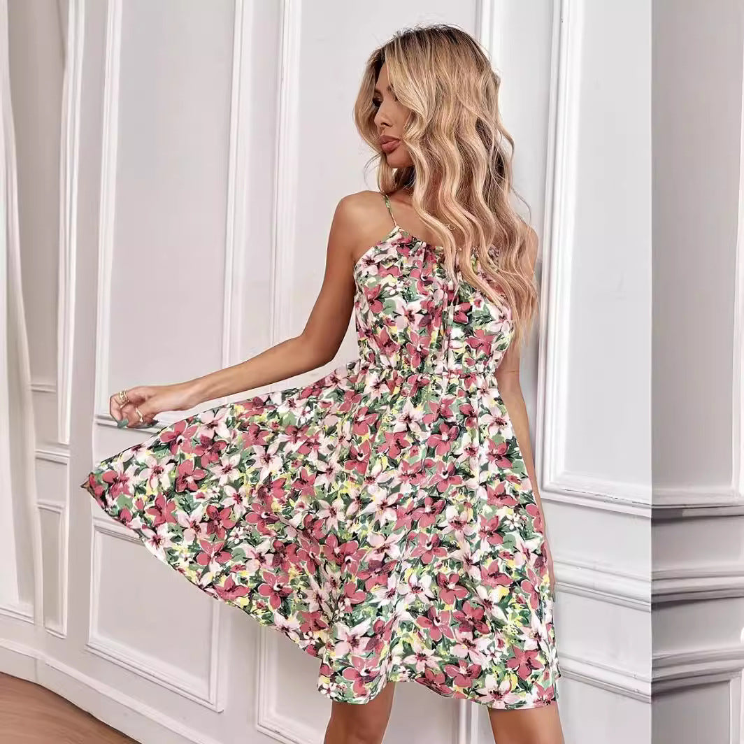 Women's floral dress with adjustable spaghetti straps and elastic waistband, size [size missing]